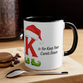 Ceramic mug with black handle, black inside rim, white body, K with Santa hat design.