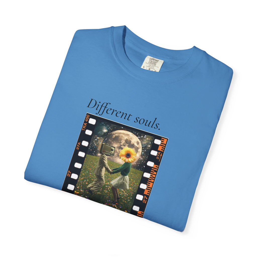 Blue crewneck graphic tee with movie-frame artwork and flower character