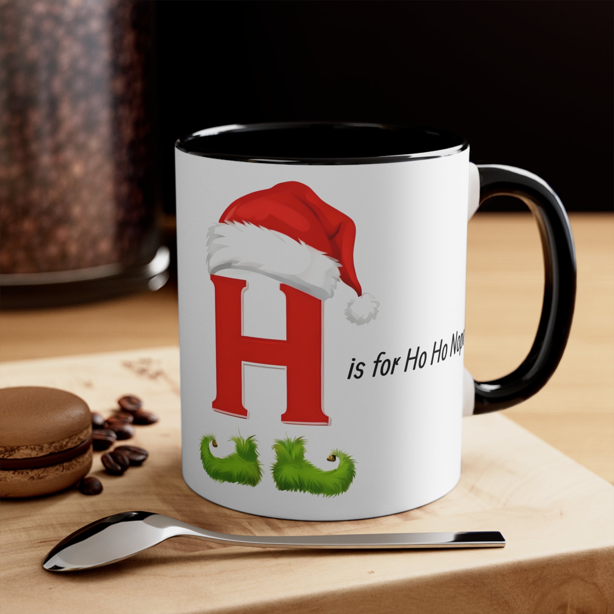 Christmas letter H mug, white with red H and Santa hat, green holly, black handle and rim