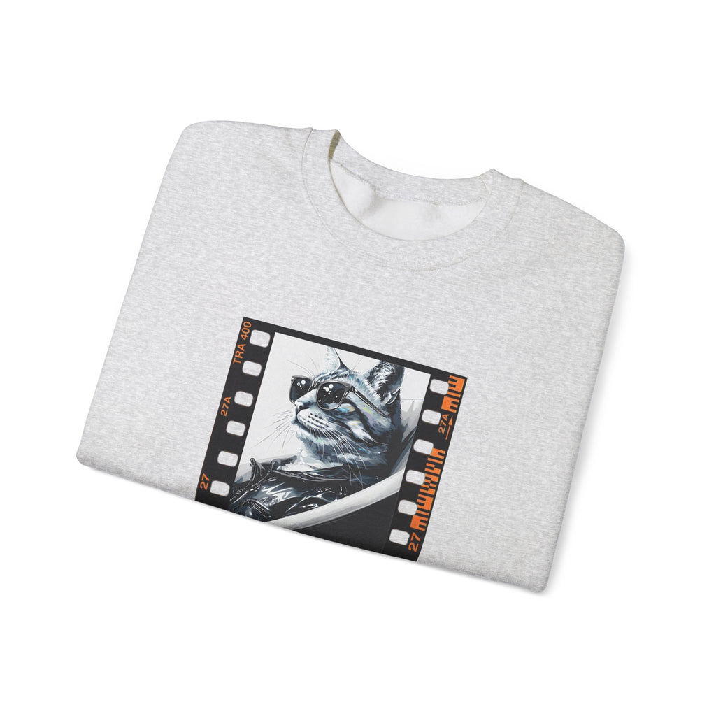 Heather gray crewneck sweatshirt, folded, with cat film strip graphic on front
