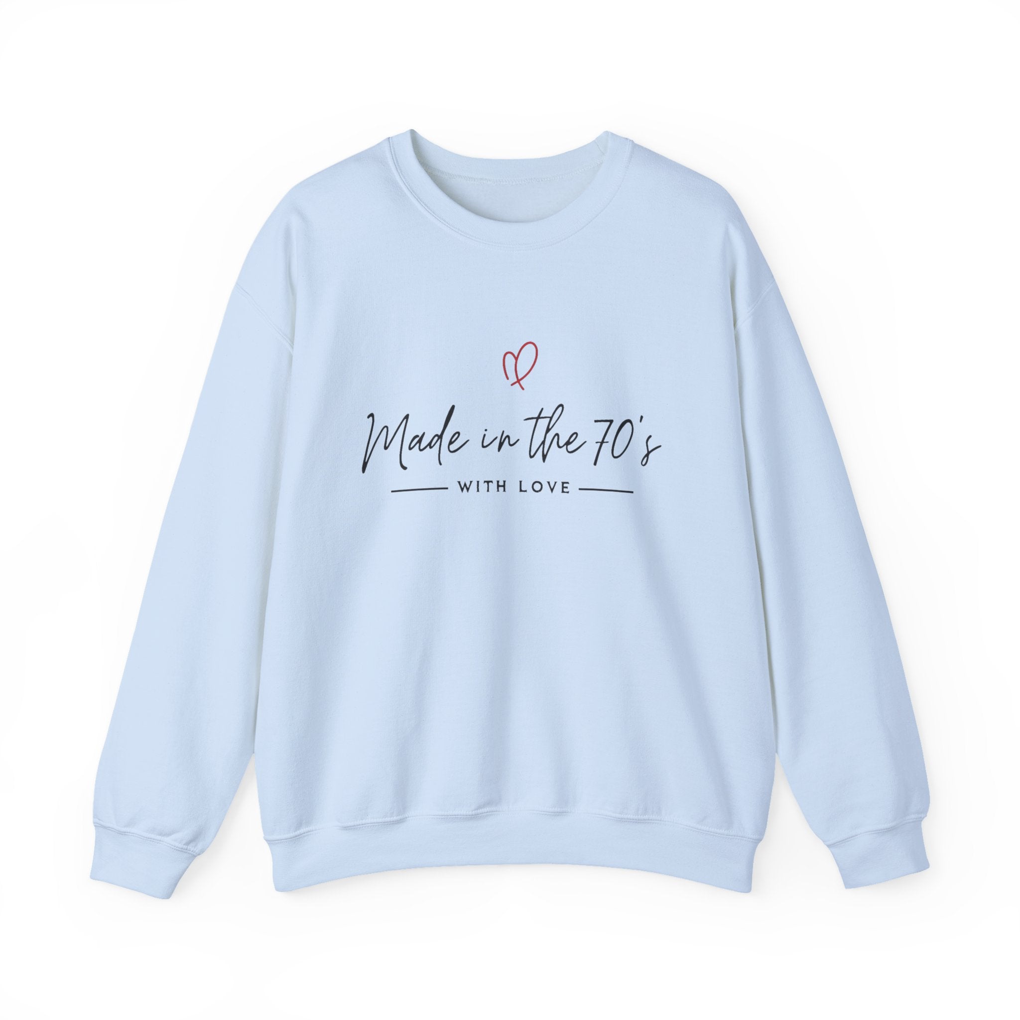 Unisex crewneck sweatshirt, light blue, front view with “Made in the 70’s” heart graphic