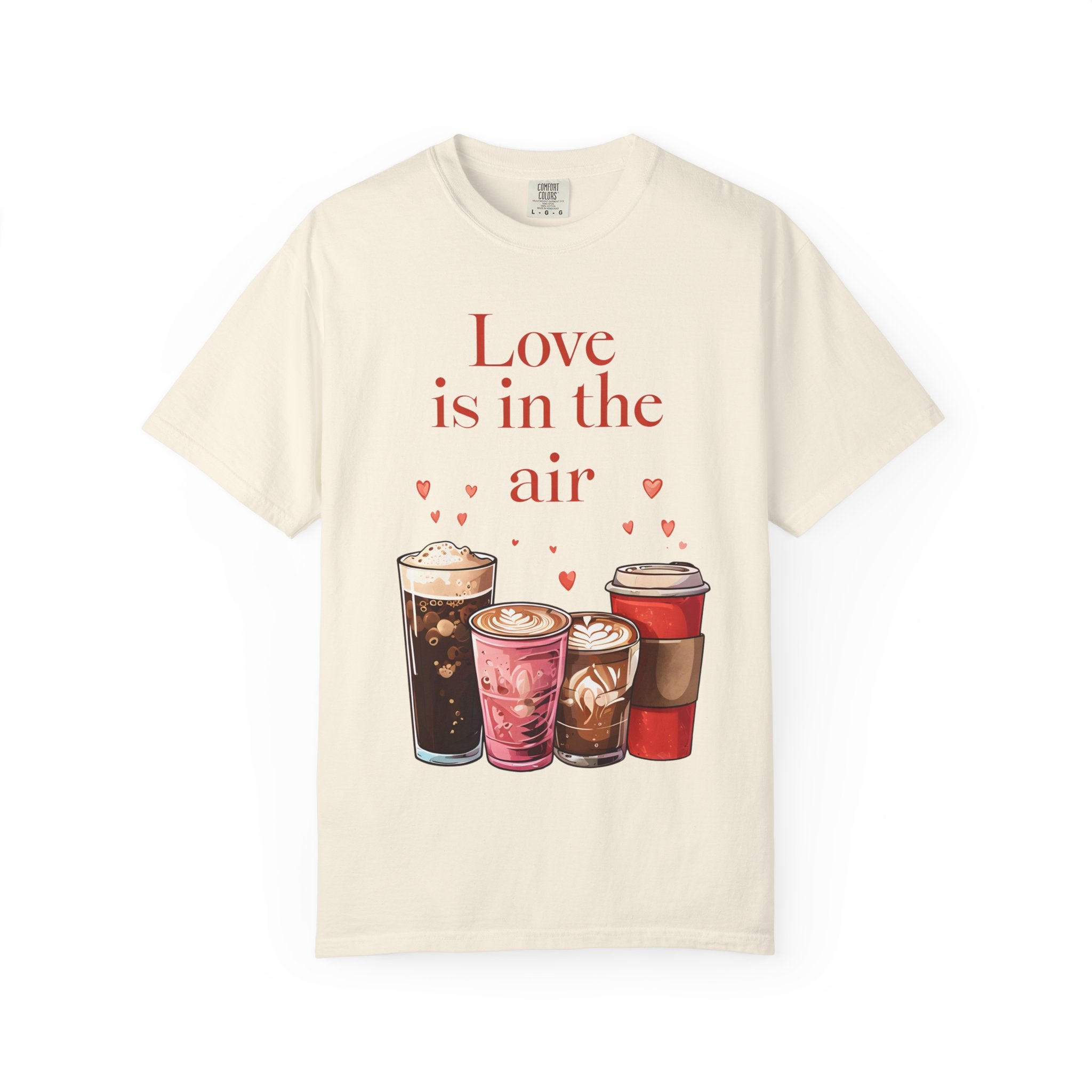 Ivory coffee graphic T-shirt with “Love is in the air” text and drink cups