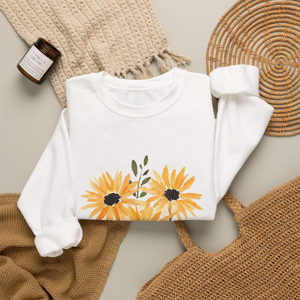White crewneck sweatshirt with sunflower bouquet print, long sleeves, ribbed cuffs