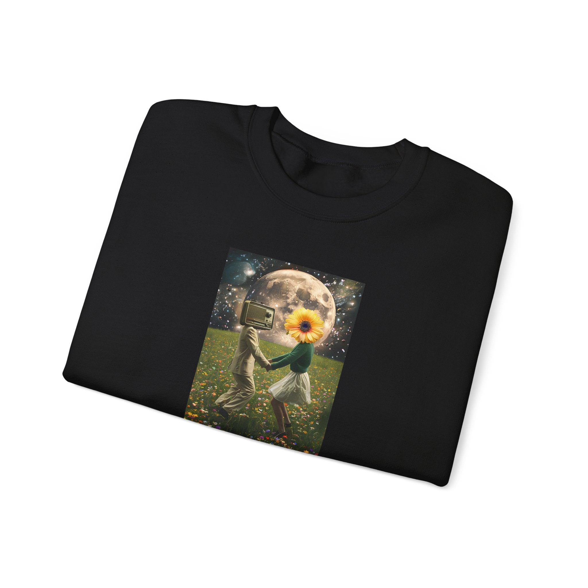 Black folded sweatshirt with front graphic featuring 'DREAMS' text, long sleeves