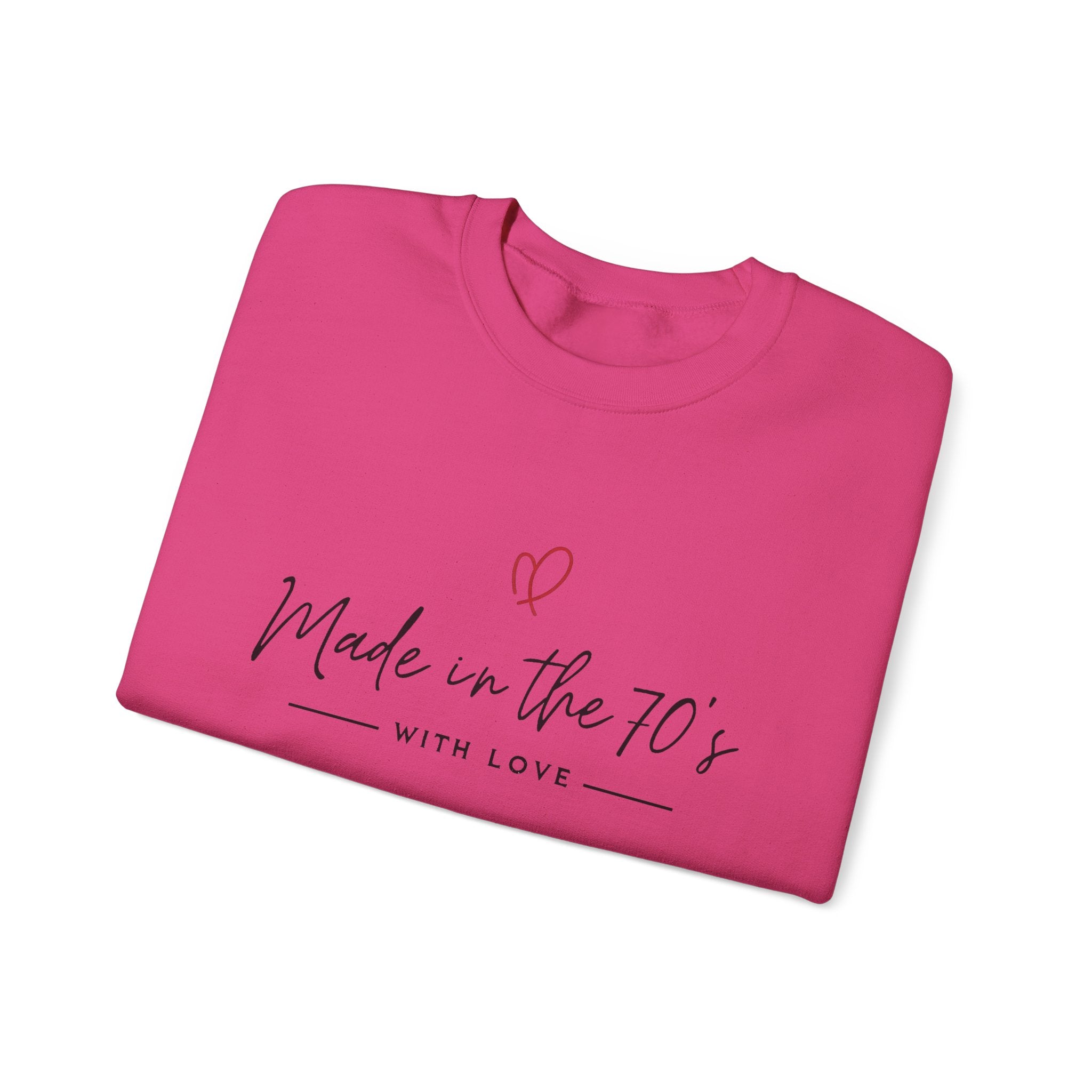 Unisex crewneck sweatshirt, hot pink, folded style with “Made in the 70’s” heart text