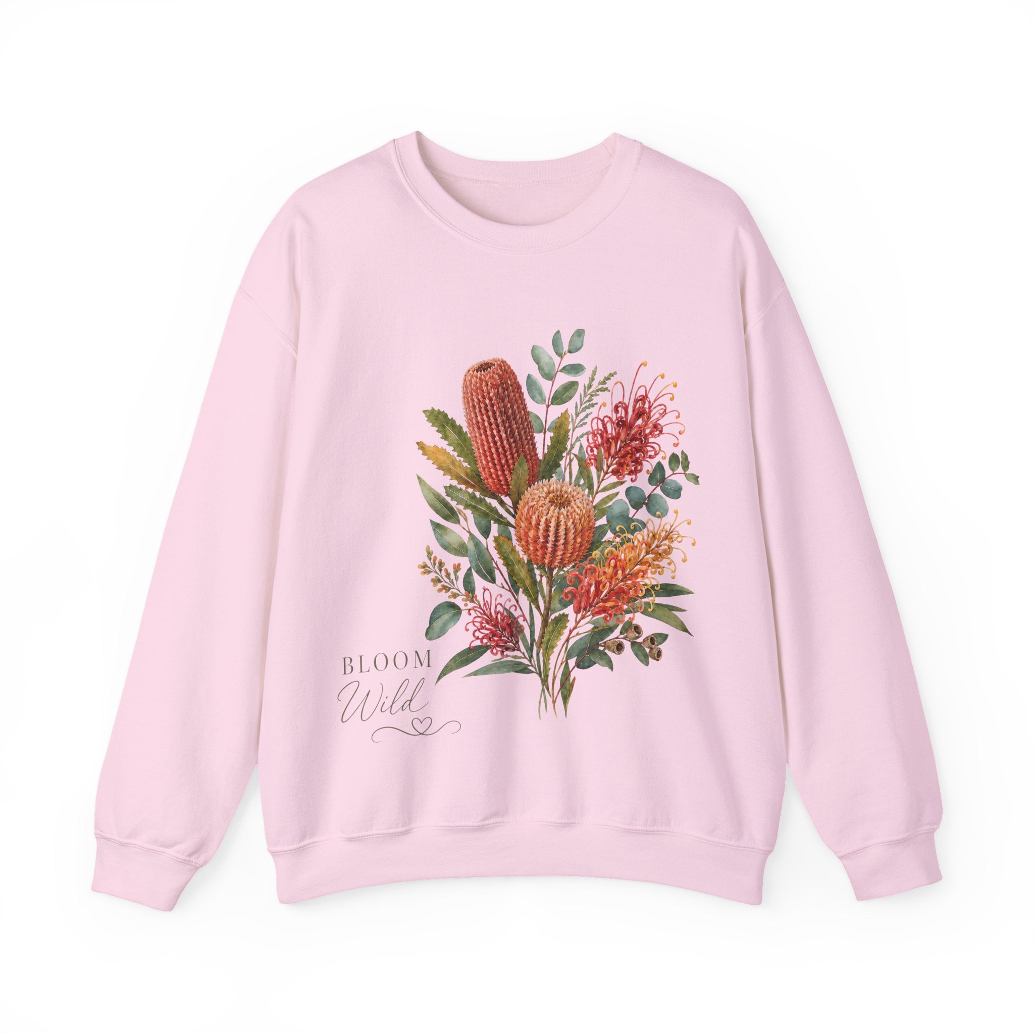 Light pink crewneck sweatshirt with wildflower bouquet and 'Bloom Wild' text, long sleeves
