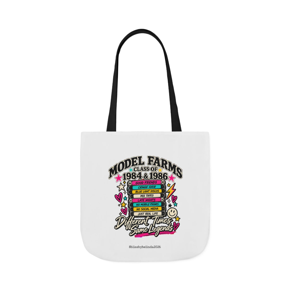 White canvas tote bag with black handles and colorful school-themed graphic panel