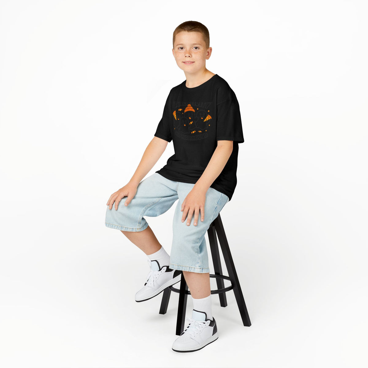 Kids black Halloween t-shirt worn by child, orange space-ghost graphic on front
