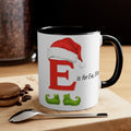 Christmas letter E mug with black handle and black interior; red E with santa hat