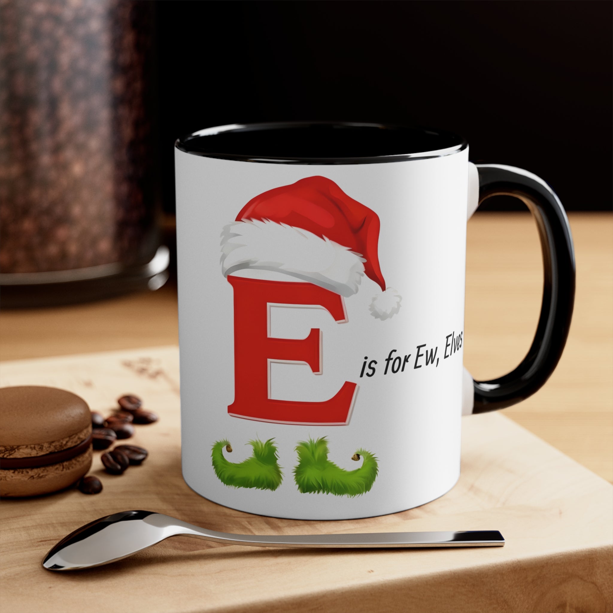 Christmas letter E mug with black handle and black interior; red E with santa hat