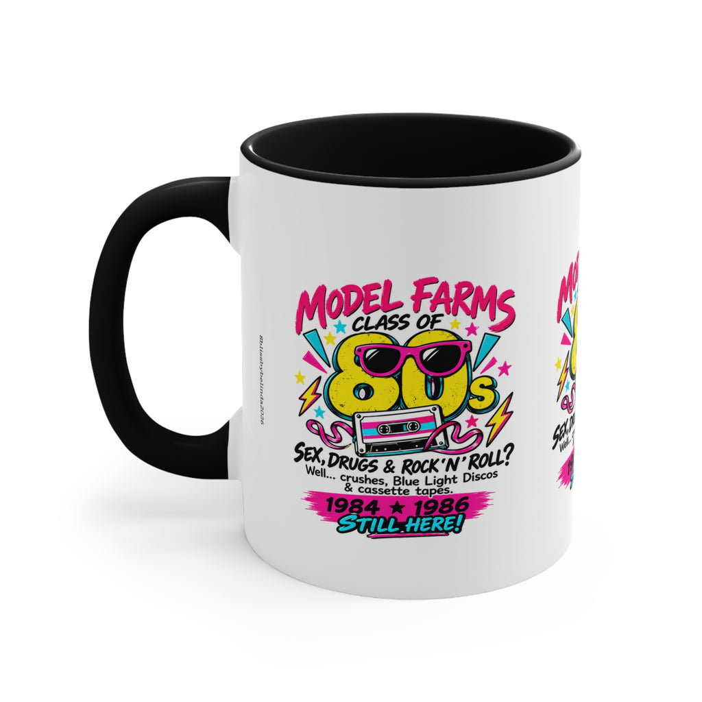 White ceramic coffee mug with black interior and handle, retro cassette graphic