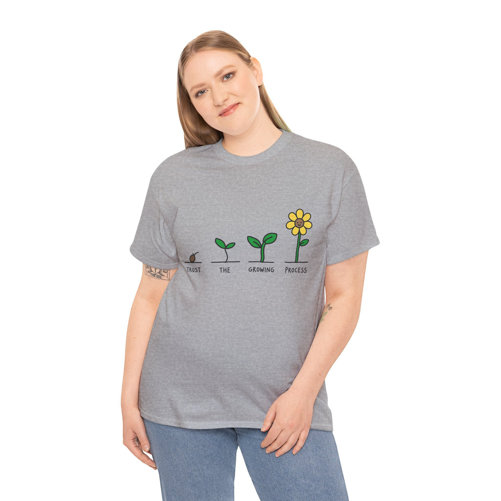 Gray crew-neck T-shirt worn by model with seedling-to-flower graphic