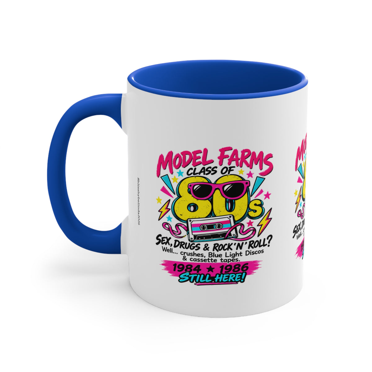 White ceramic coffee mug with blue interior and handle, retro cassette graphic