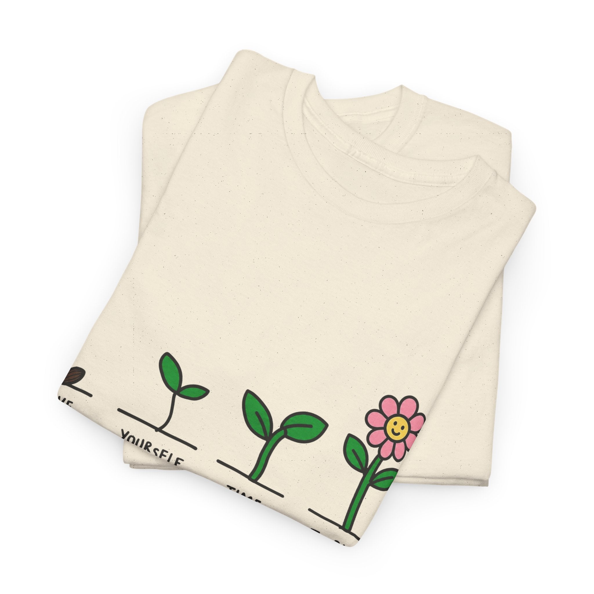Off-white graphic t-shirt with green plant growth line and pink flower print on front hem