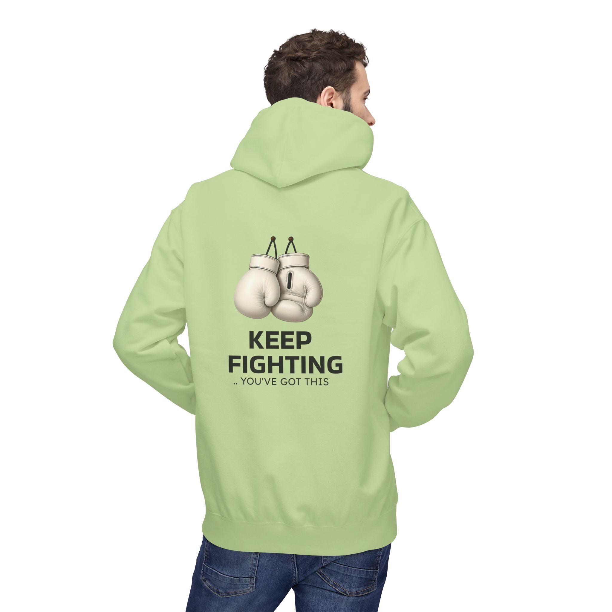 Light green hoodie with back boxing-glove graphic and message “KEEP FIGHTING”