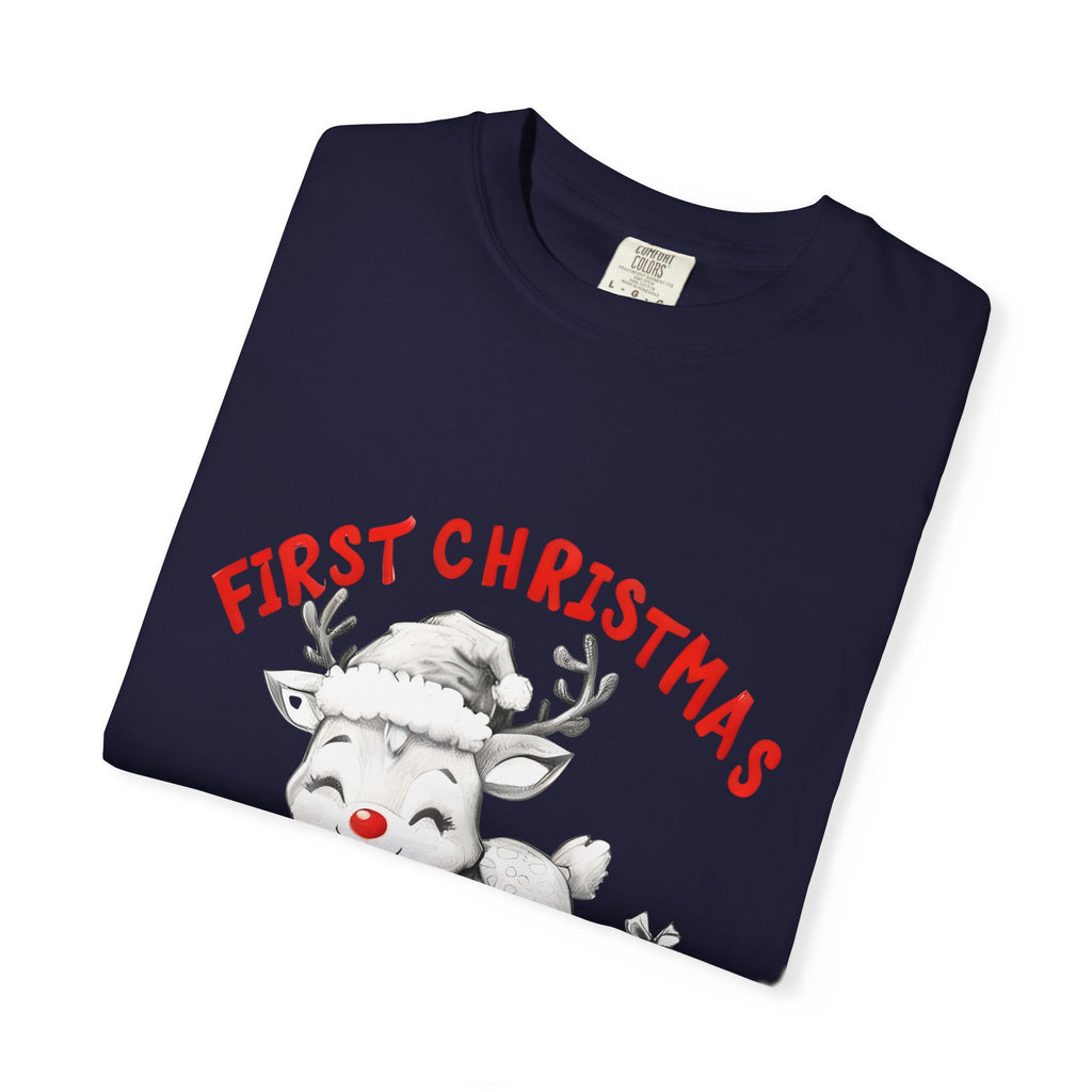 Navy T-shirt close-up: reindeer graphic with red "FIRST CHRISTMAS" text and "2025"