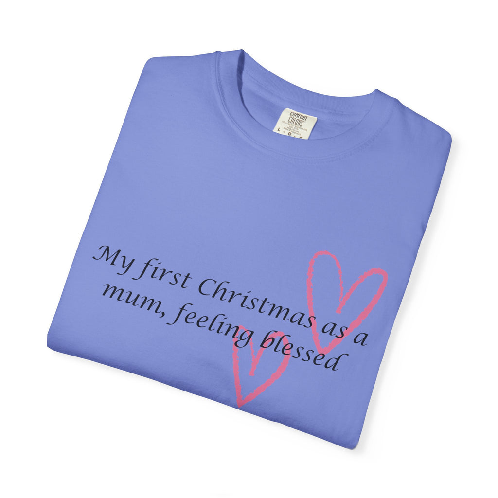 Folded blue Christmas mum t-shirt showing pink heart and “My first Christmas” text