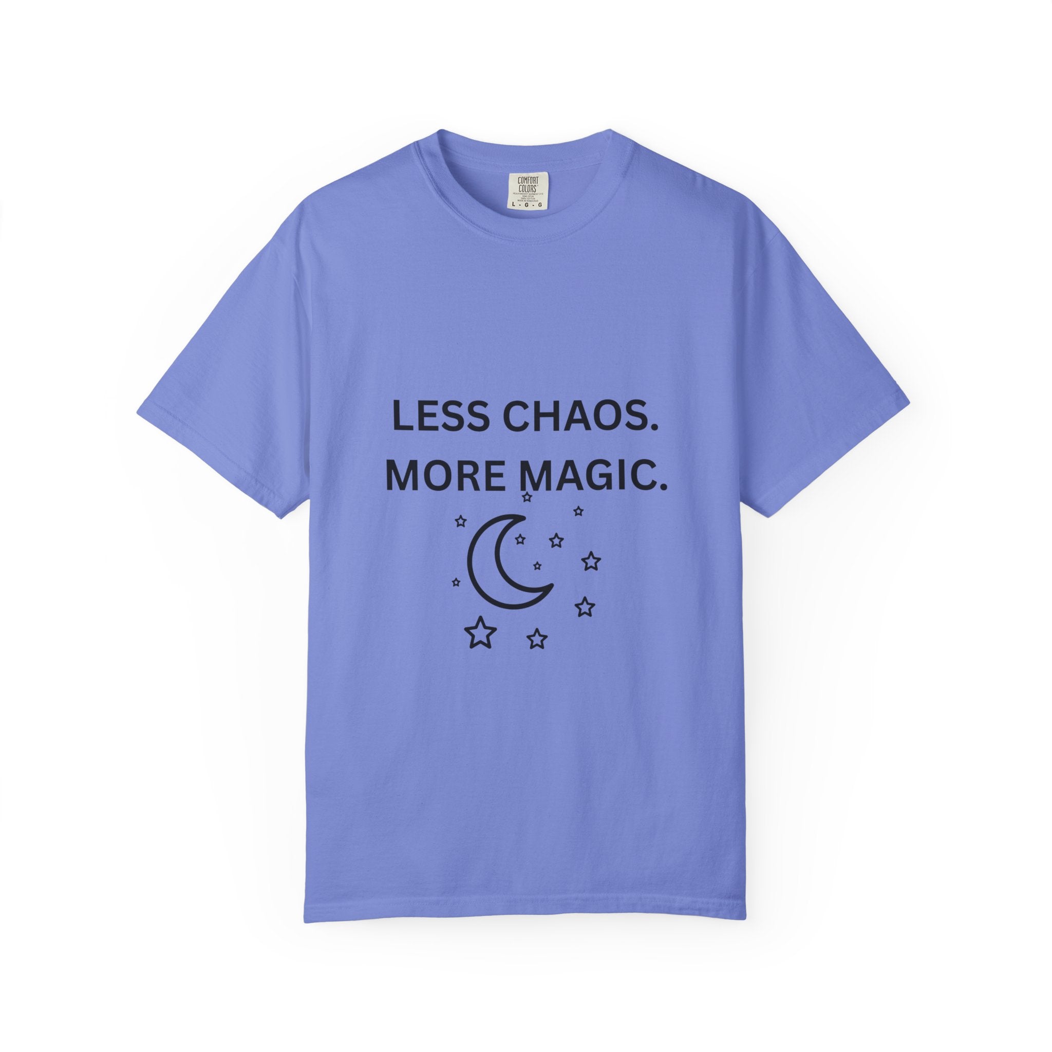 Periwinkle blue graphic t-shirt with 'LESS CHAOS. MORE MAGIC.' and crescent moon stars print