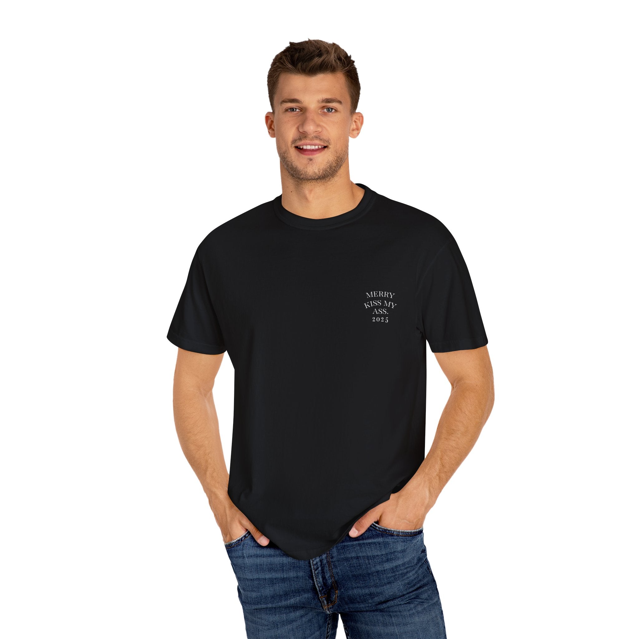 Black unisex T-shirt with small chest text “MERRY KISS MY ASS. 2025”