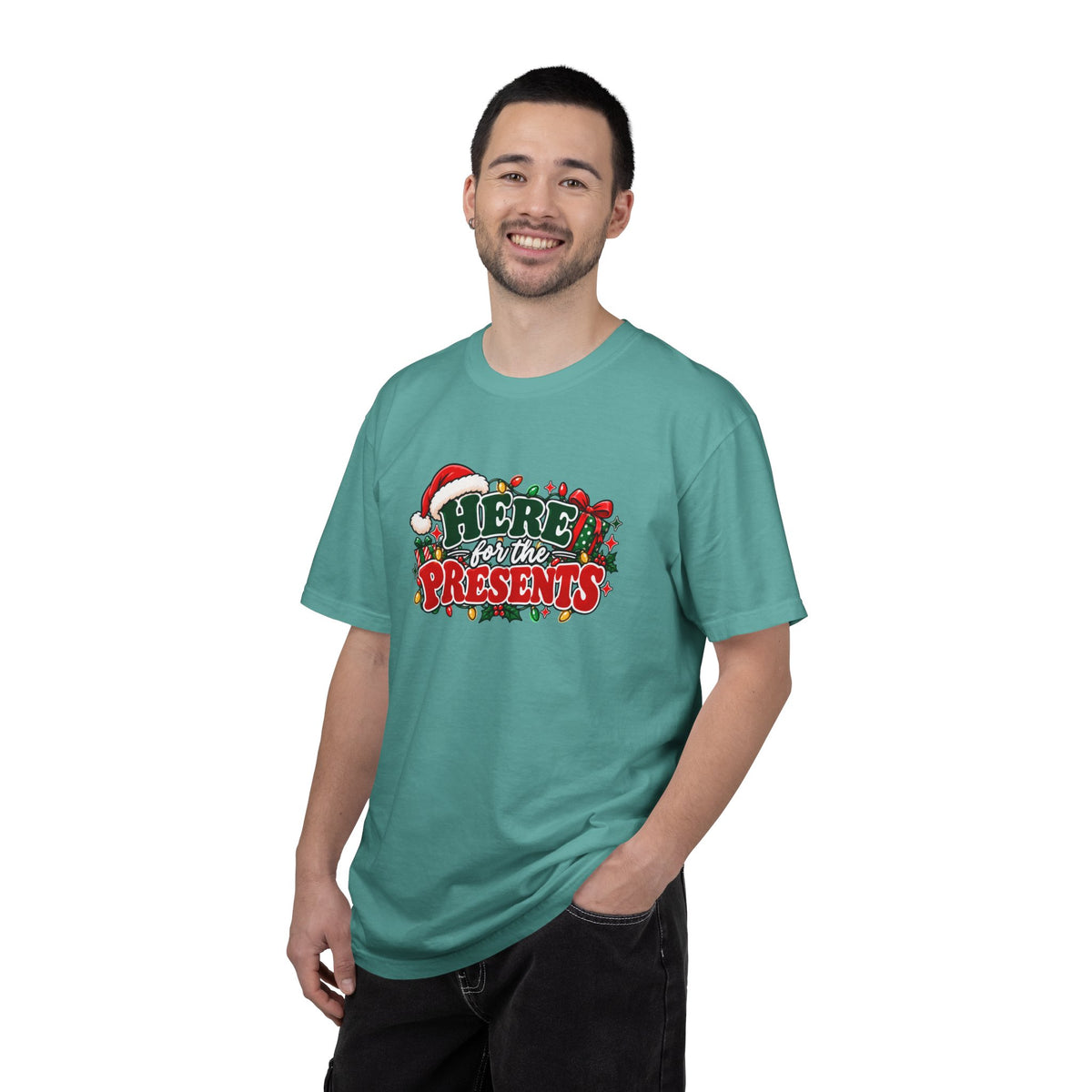 Teal crewneck T-shirt with chest 'Here for the Presents' graphic, model standing