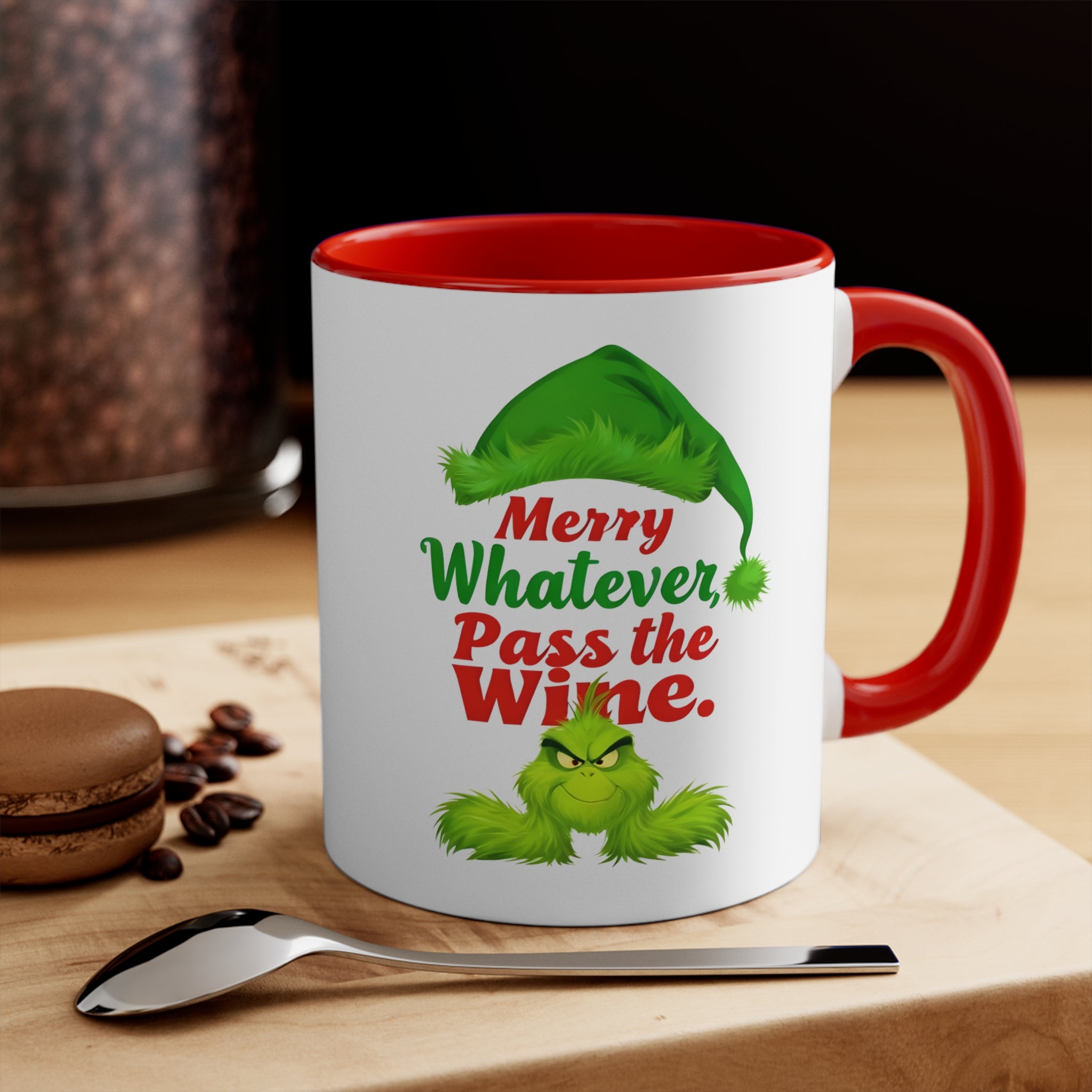 White Christmas mug with red handle, green elf graphic reading “Merry Whatever Pass the Wine.”