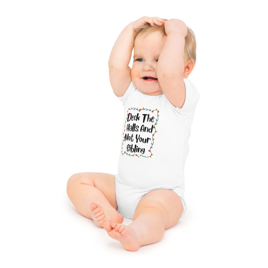 White baby onesie with holiday lights text graphic, short sleeves, worn by baby