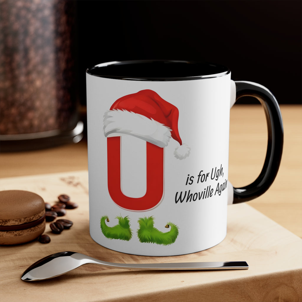 Christmas letter U mug, white with red Santa hat graphic, green holly, black handle and rim