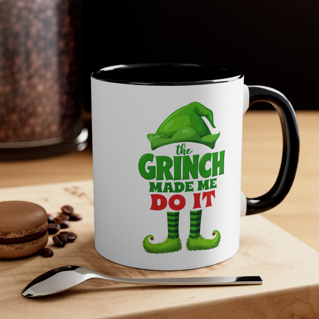 Black-handled Christmas mug with green Grinch “the GRINCH MADE ME DO IT” graphic