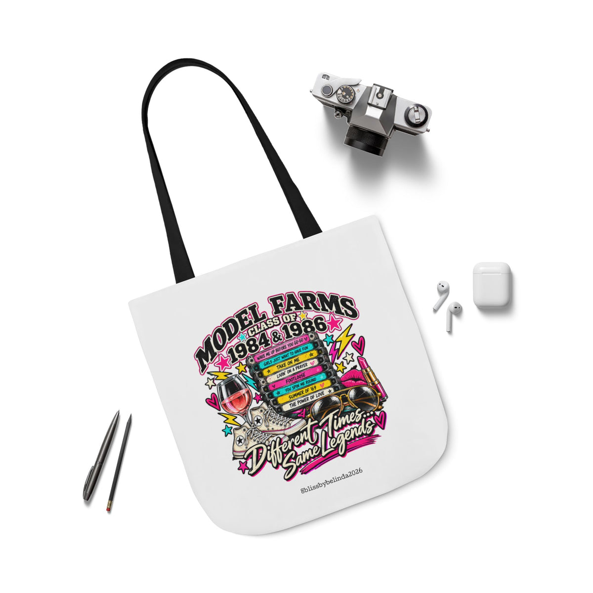 White canvas tote bag with black handles, Model Farms class graphic on the front.