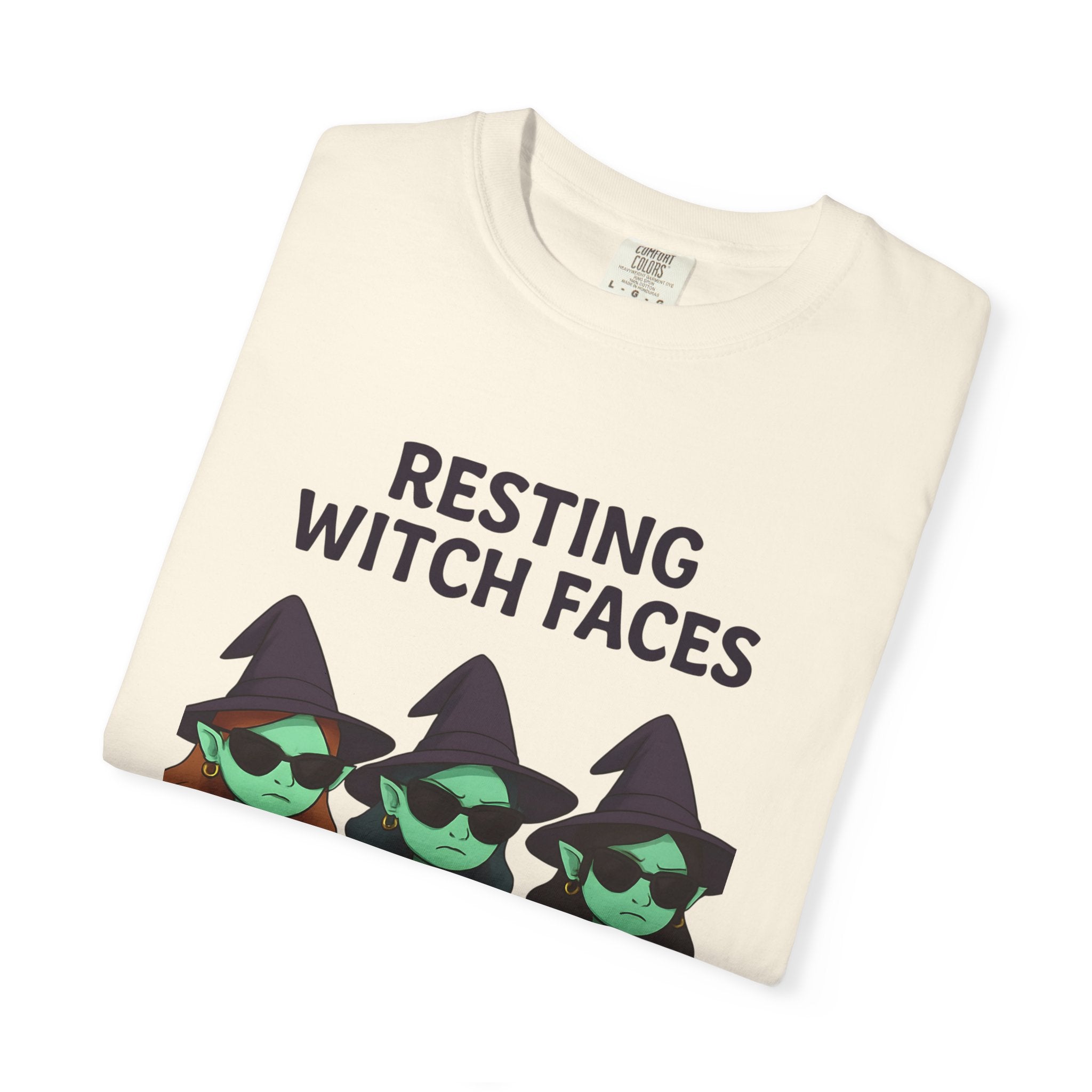 Ivory T-shirt with “RESTING WITCH FACES” text and witch faces graphic