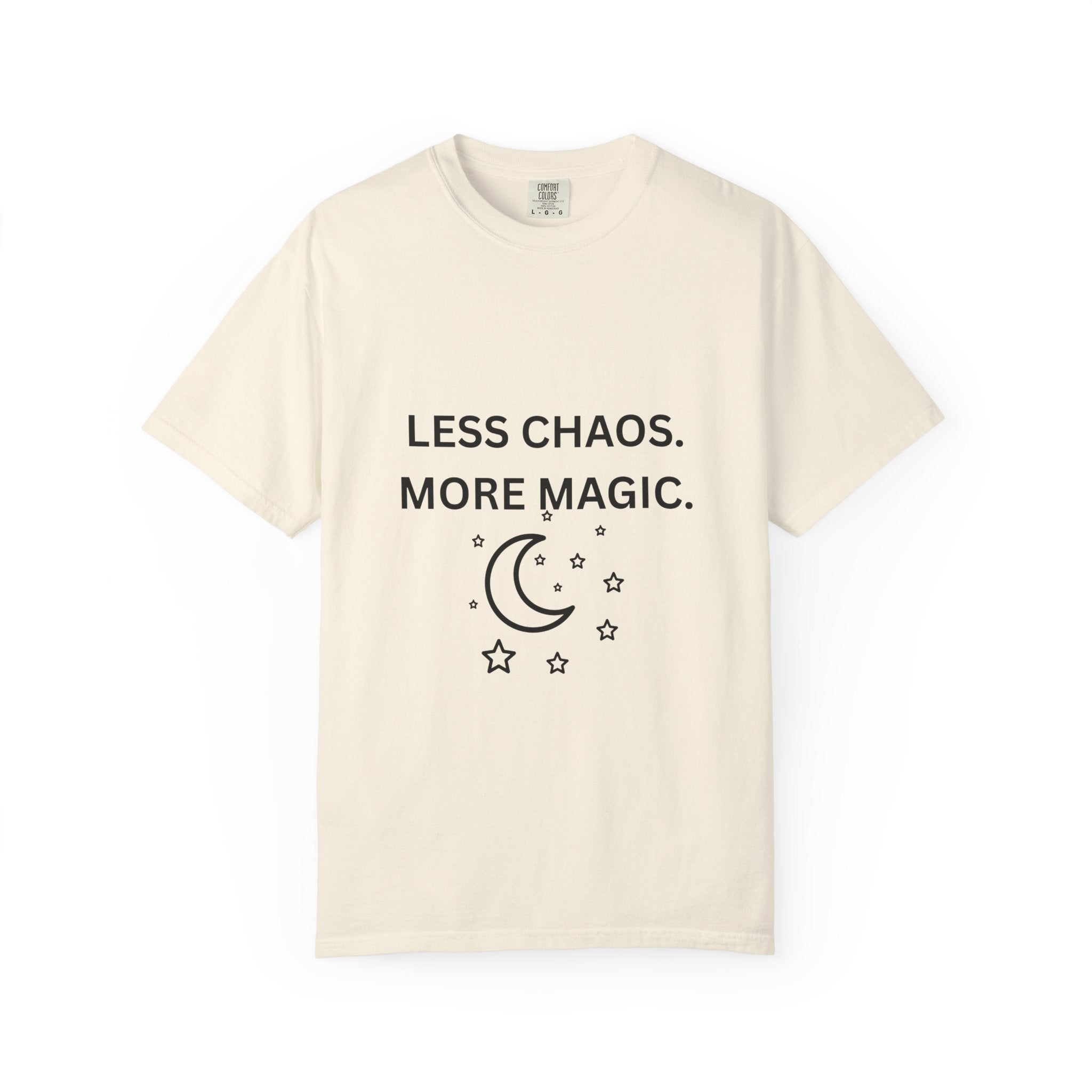 Ivory graphic t-shirt with 'LESS CHAOS. MORE MAGIC.' and crescent moon stars print