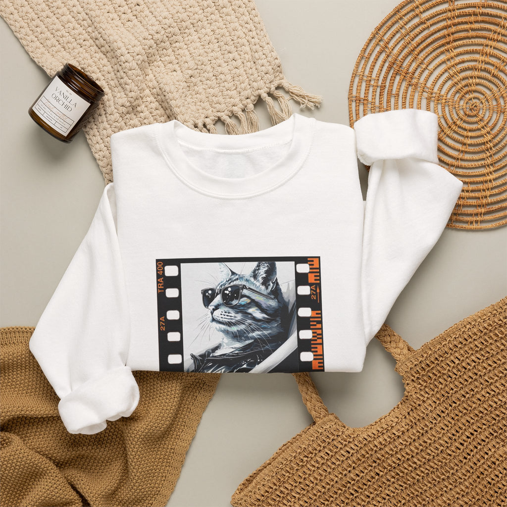 White crewneck sweatshirt with cat film-strip graphic, ribbed hem and cuffs