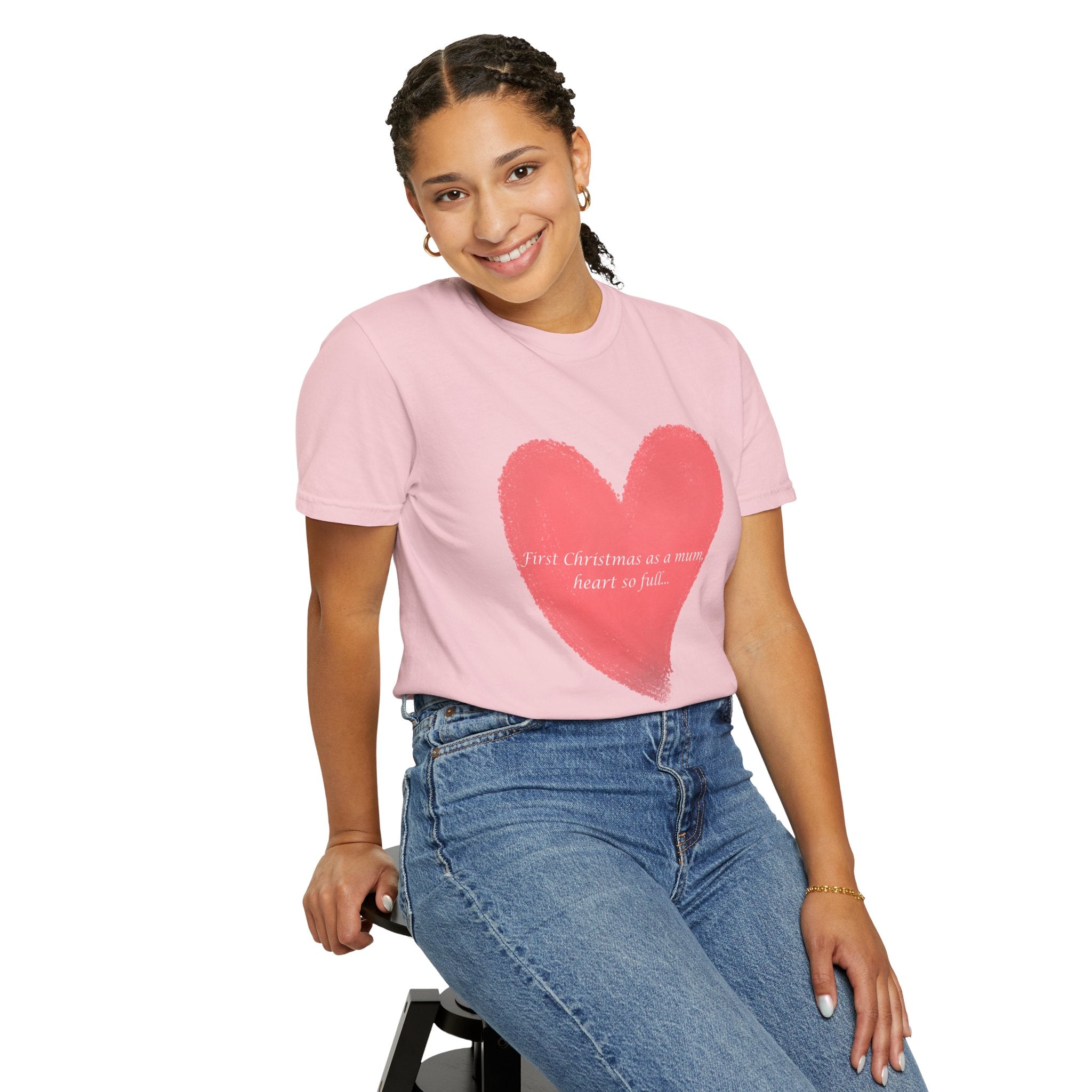 Blush pink T-shirt with red heart graphic and small script text under the heart