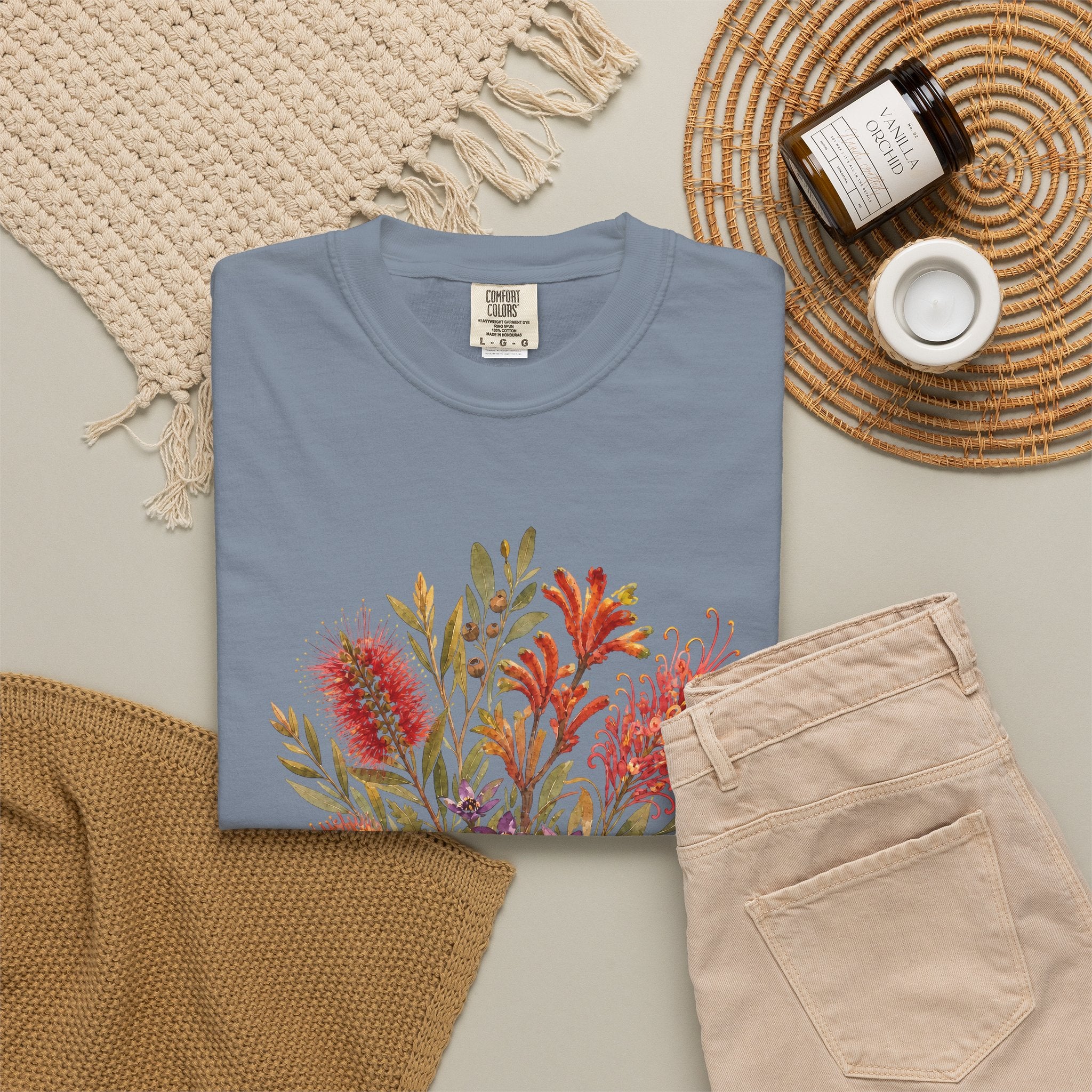 Blue jean crew-neck T-shirt with colorful floral bouquet graphic at center