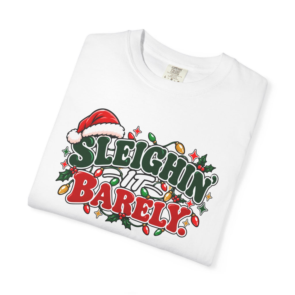 White unisex crewneck Christmas graphic t-shirt with “Sleighin’ it Barely” print
