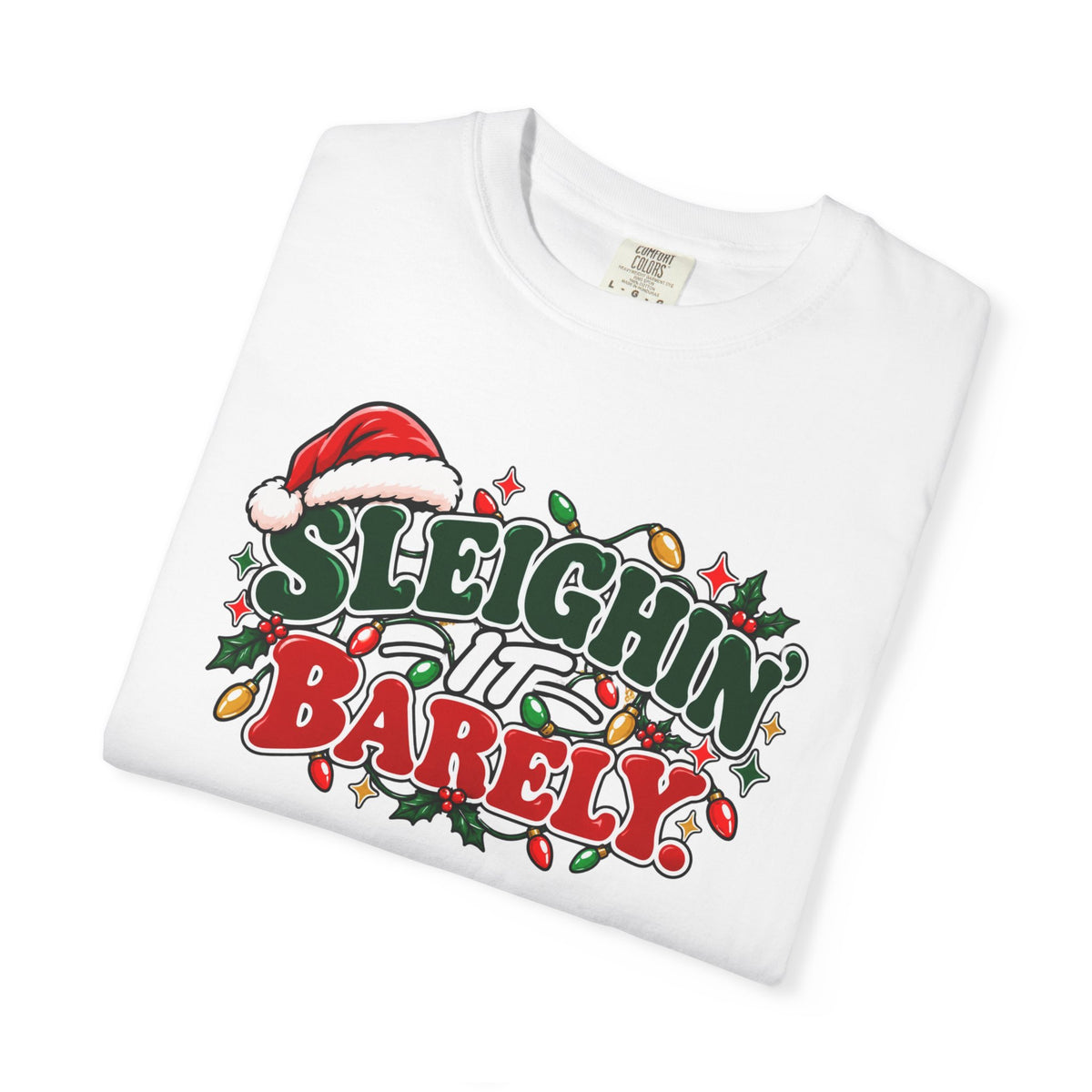 White unisex crewneck Christmas graphic t-shirt with “Sleighin’ it Barely” print