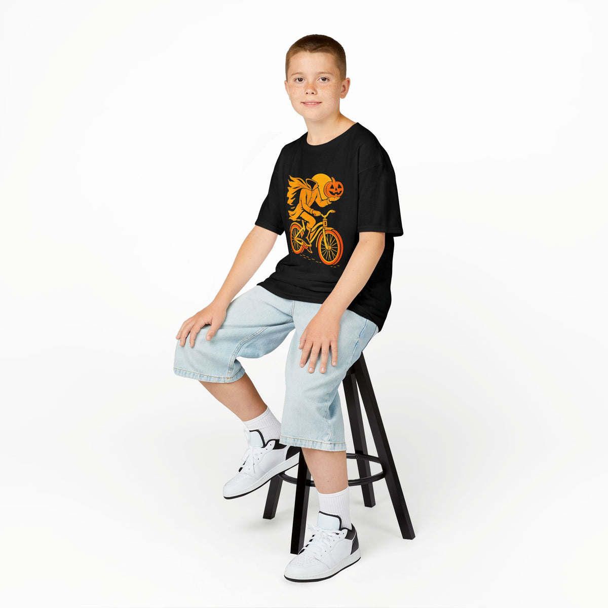 Kids' black pumpkin-head biker graphic T-shirt, crew neck, short sleeves