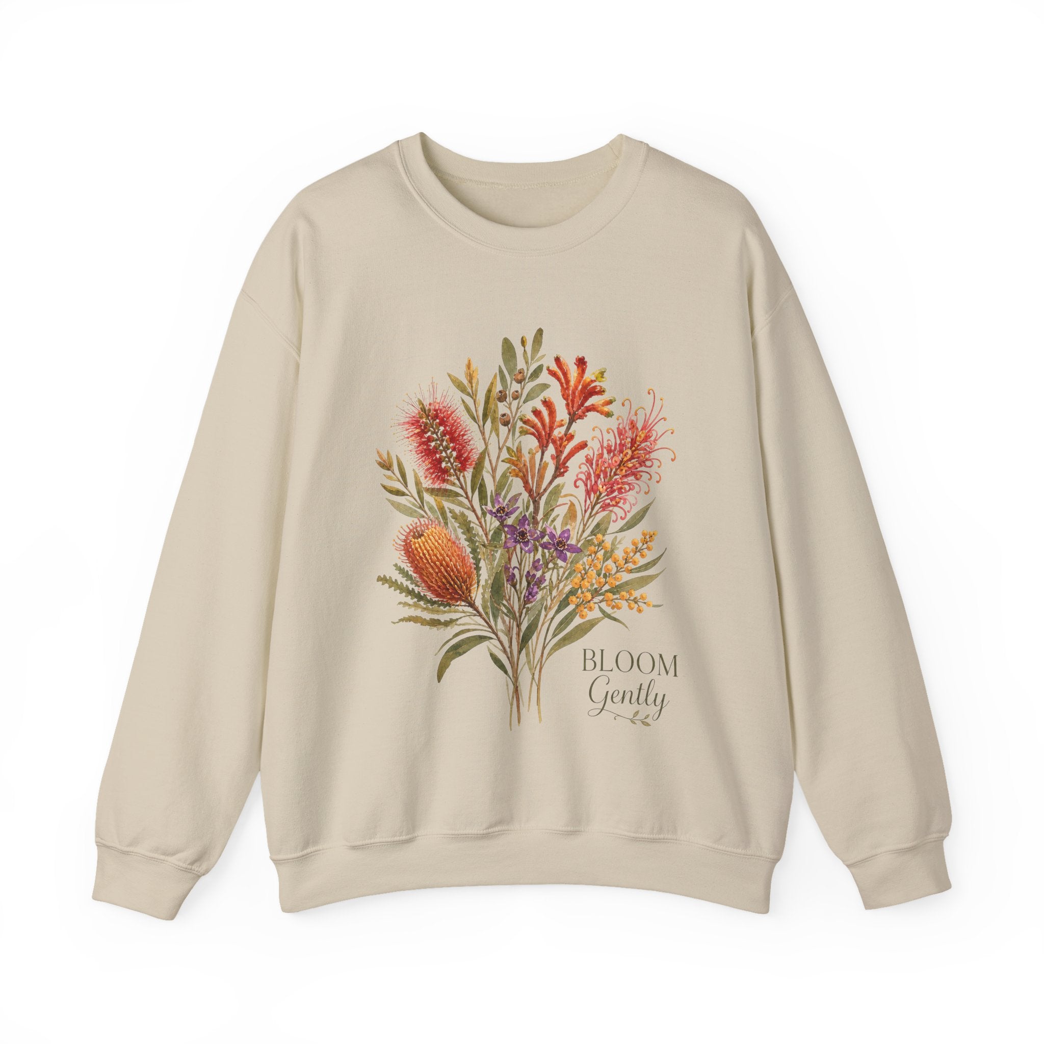 Beige crewneck sweatshirt with colorful floral bouquet graphic and “BLOOM Gently” text.