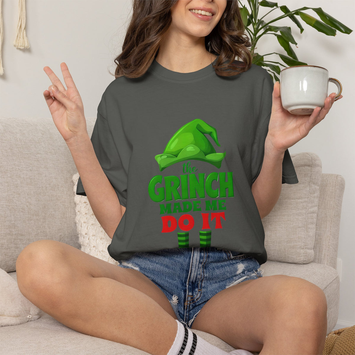 Graphite unisex T-shirt with green and red 'Grinch made me do it' graphic