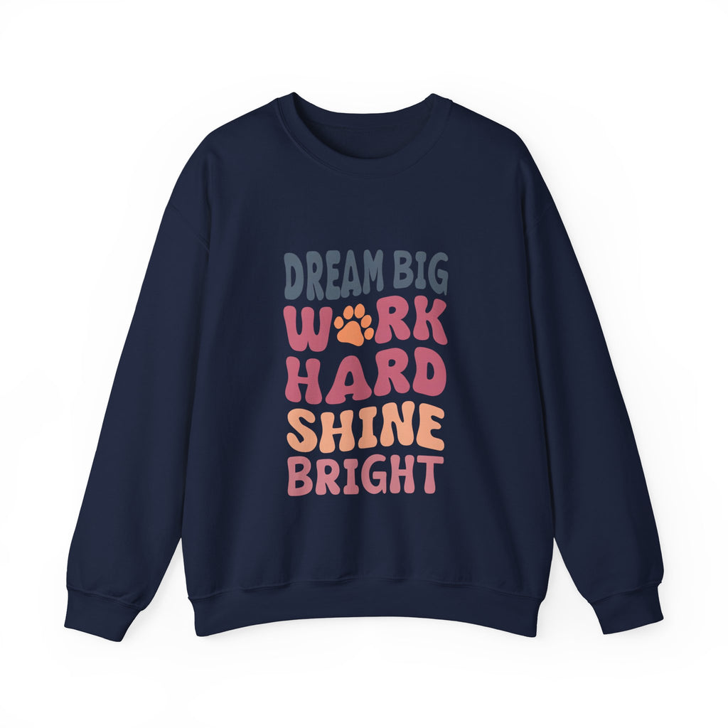 Navy crewneck sweatshirt with colorful motivational paw-print graphic on chest