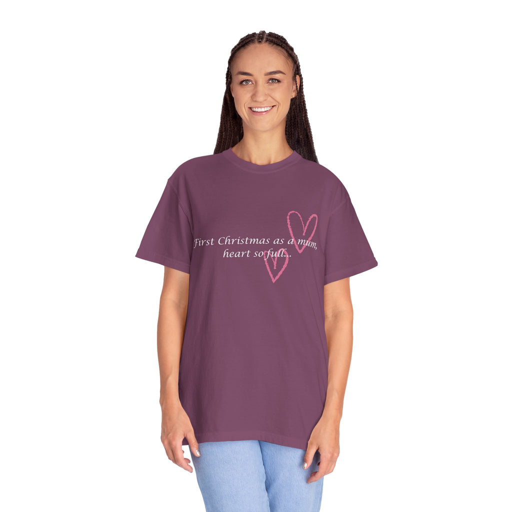 Dark purple Christmas mum heart T-shirt on model with pink heart graphic and “First Christmas as a mum”