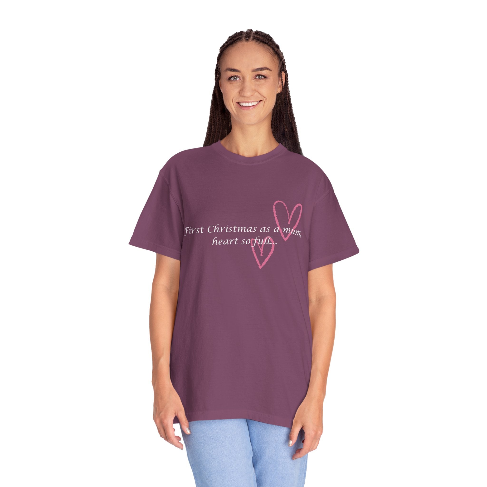 Dark purple Christmas mum heart T-shirt on model with pink heart graphic and “First Christmas as a mum”