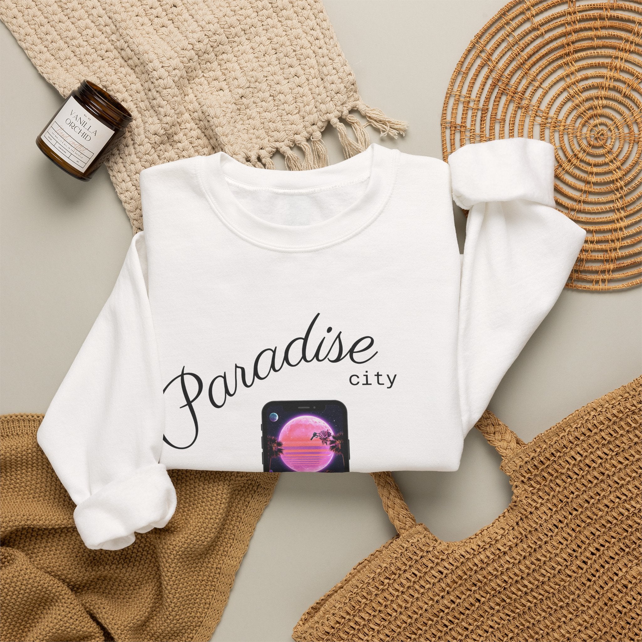 White crewneck sweatshirt front view with phone sunset graphic and cursive text
