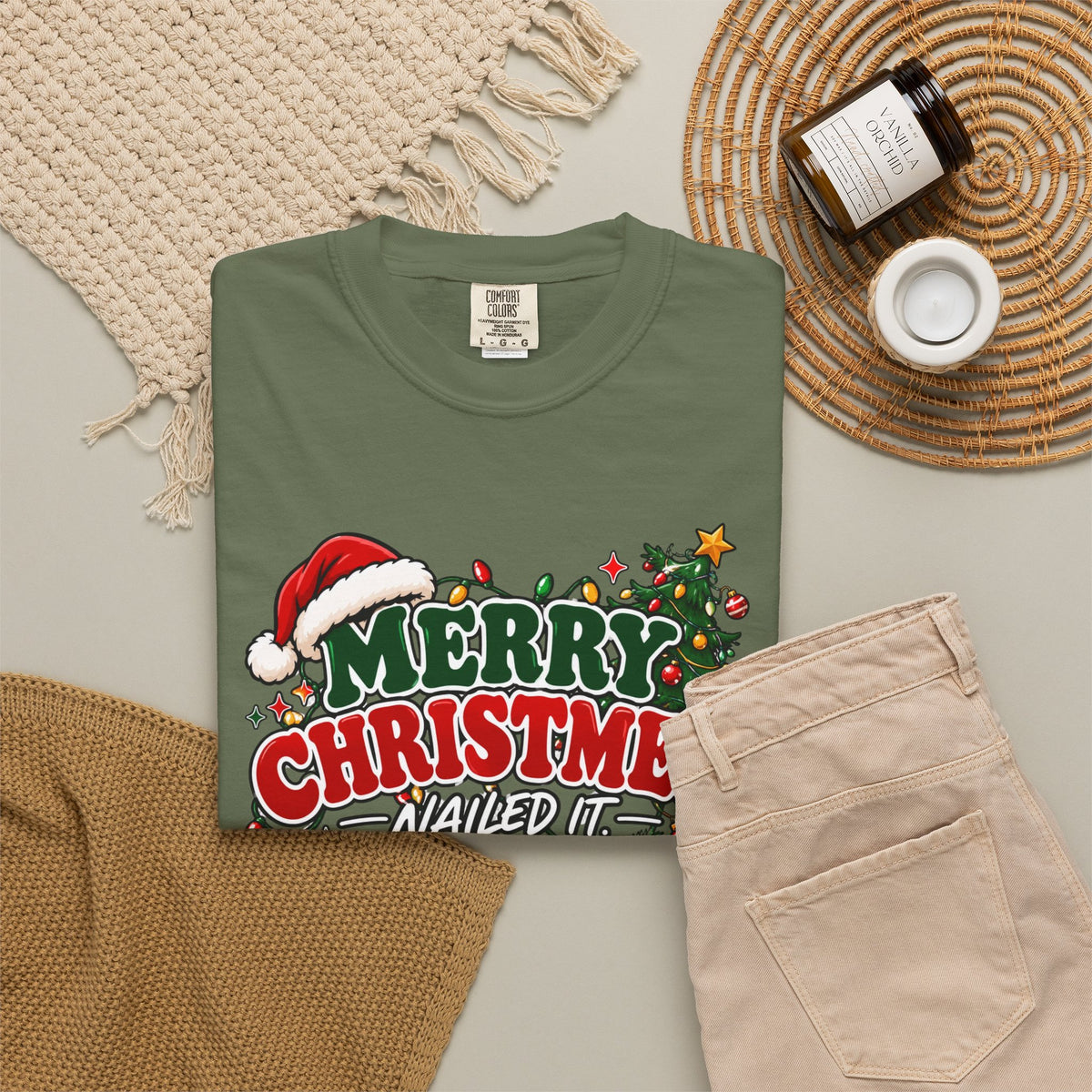 Green crewneck Christmas t-shirt with 'Merry Christmas Nailed It' front graphic