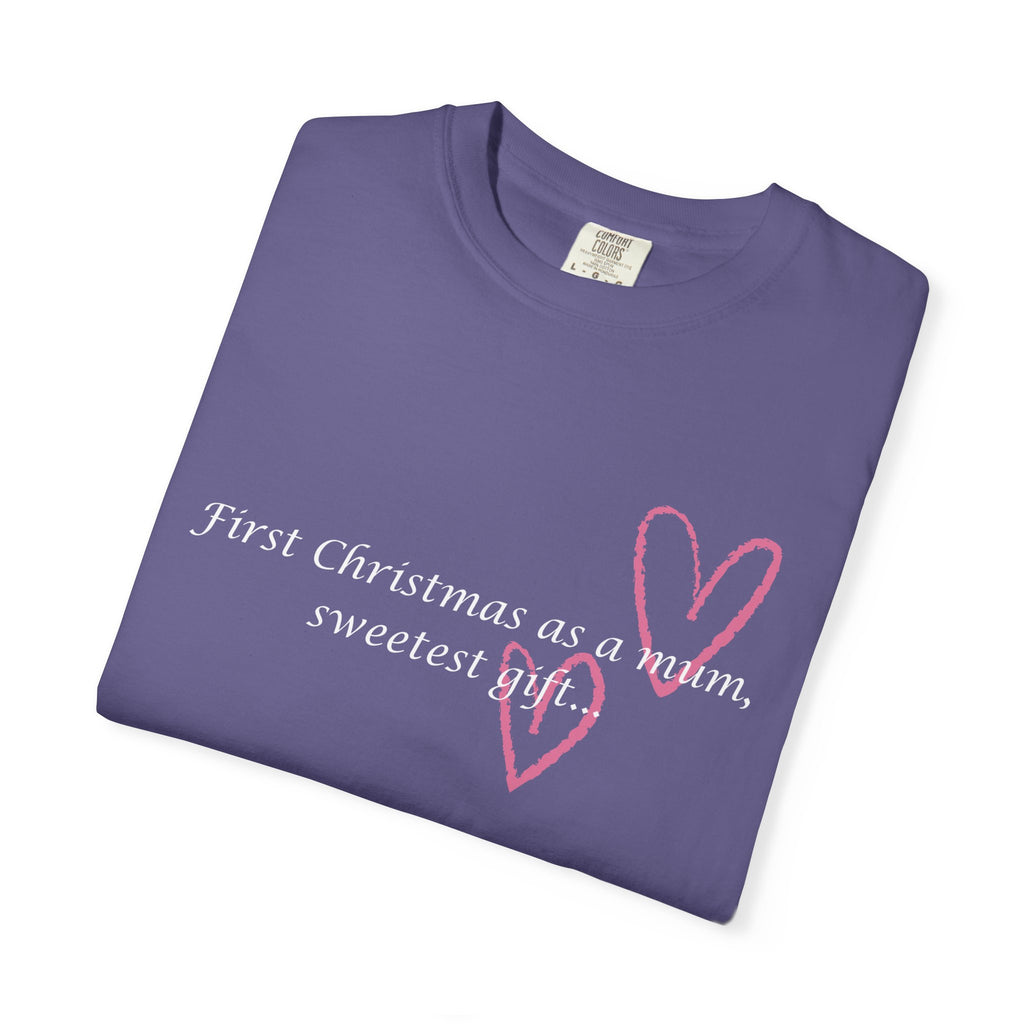 Purple crewneck T-shirt close-up with “First Christmas as a mum, sweetest gift” print