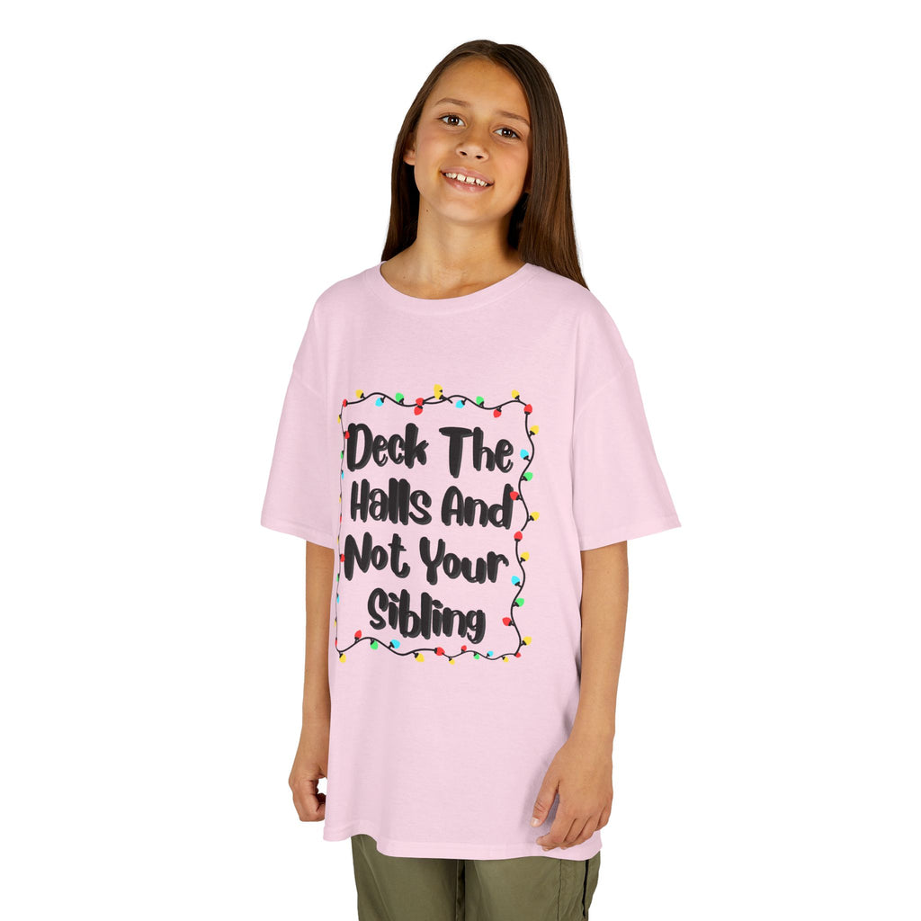 Light pink kids graphic tee on child, colorful holiday lights slogan design