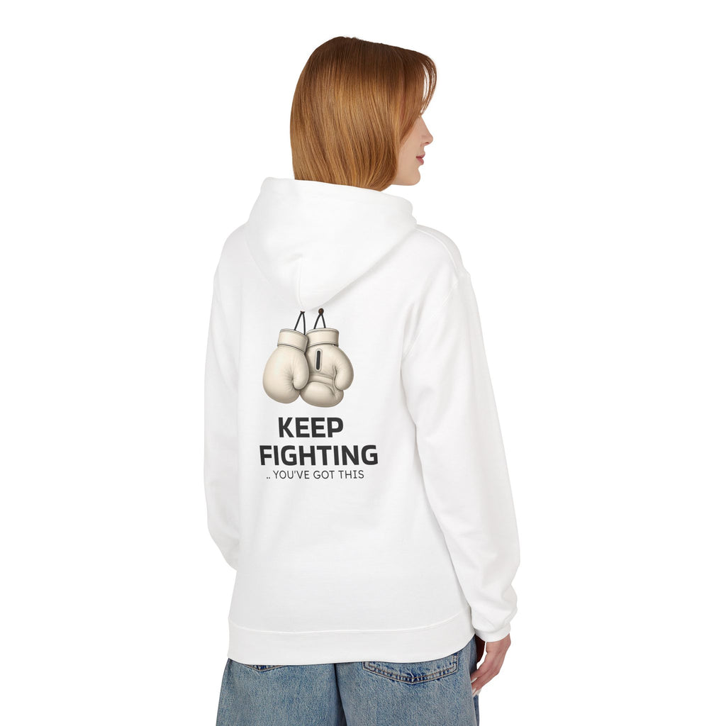 White hoodie with back boxing-glove graphic and message “KEEP FIGHTING”