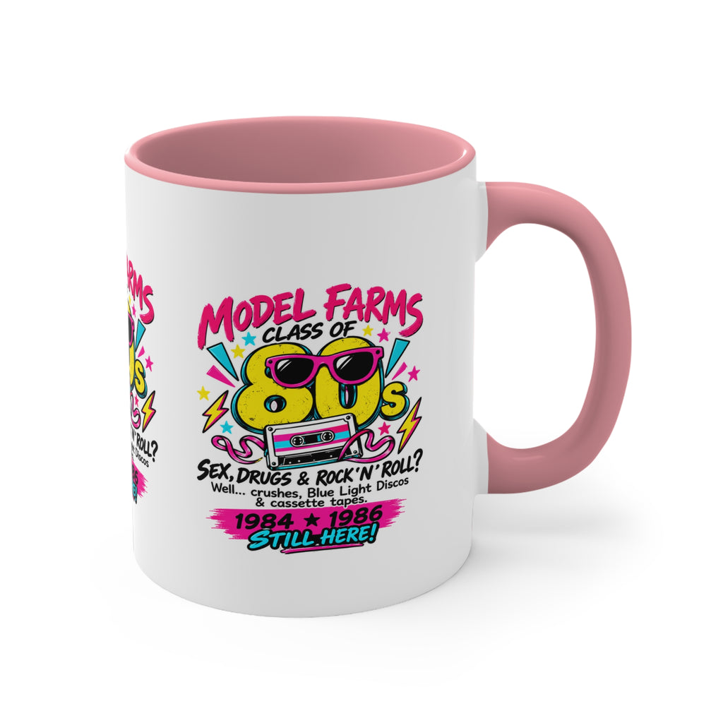 Pink handle ceramic coffee mug with colorful retro farm-and-cassette graphic
