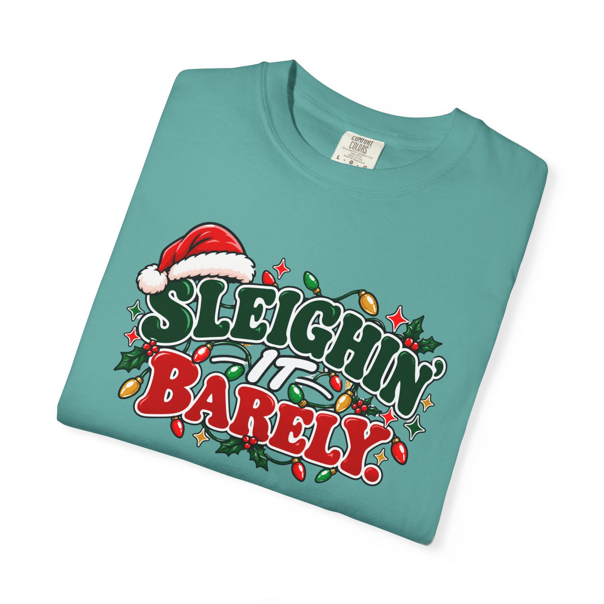 Teal crew-neck T-shirt with 'Sleighin' It Barely' holiday graphic