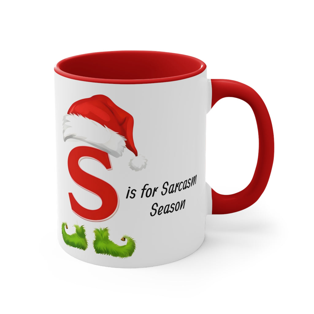 Ceramic coffee mug, white with red handle and rim; red 'S' and 'Sarcasm Season'
